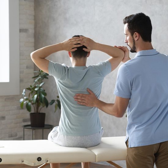 medium-shot-man-helping-patient-physiotherapy medium-shot-man-helping-patient-physiotherapy
